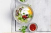 Congee con uovo in camicia