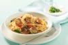 Spaghetti alle vongole con pomodori ed erbe aromatiche
