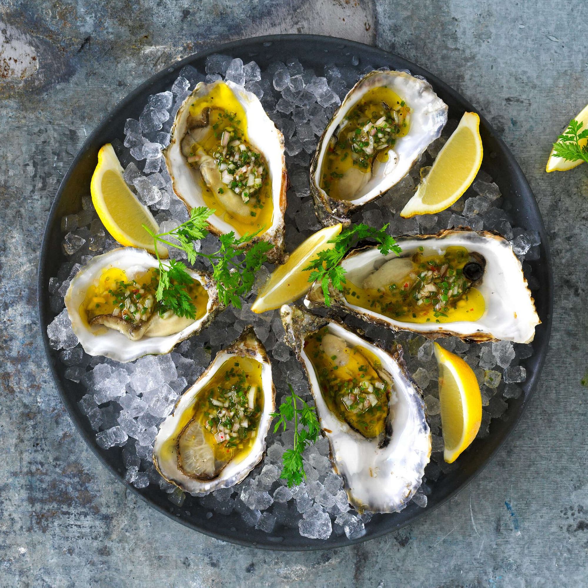 Überbackene Austern mit rosa Pfeffer | Migusto Überbackene Austern mit rosa Pfeffer | Migusto