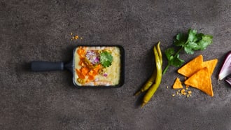 Raclette con topping di nachos