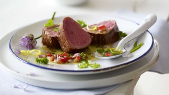 Medaglioni di maiale con vinaigrette alle erbe