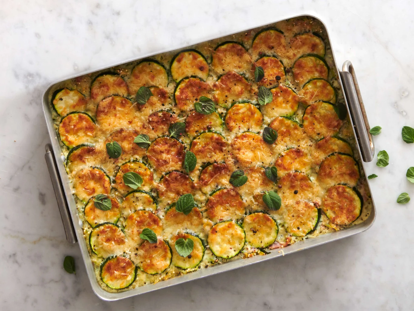 Gratin di zucchine con quinoa e prosciutto