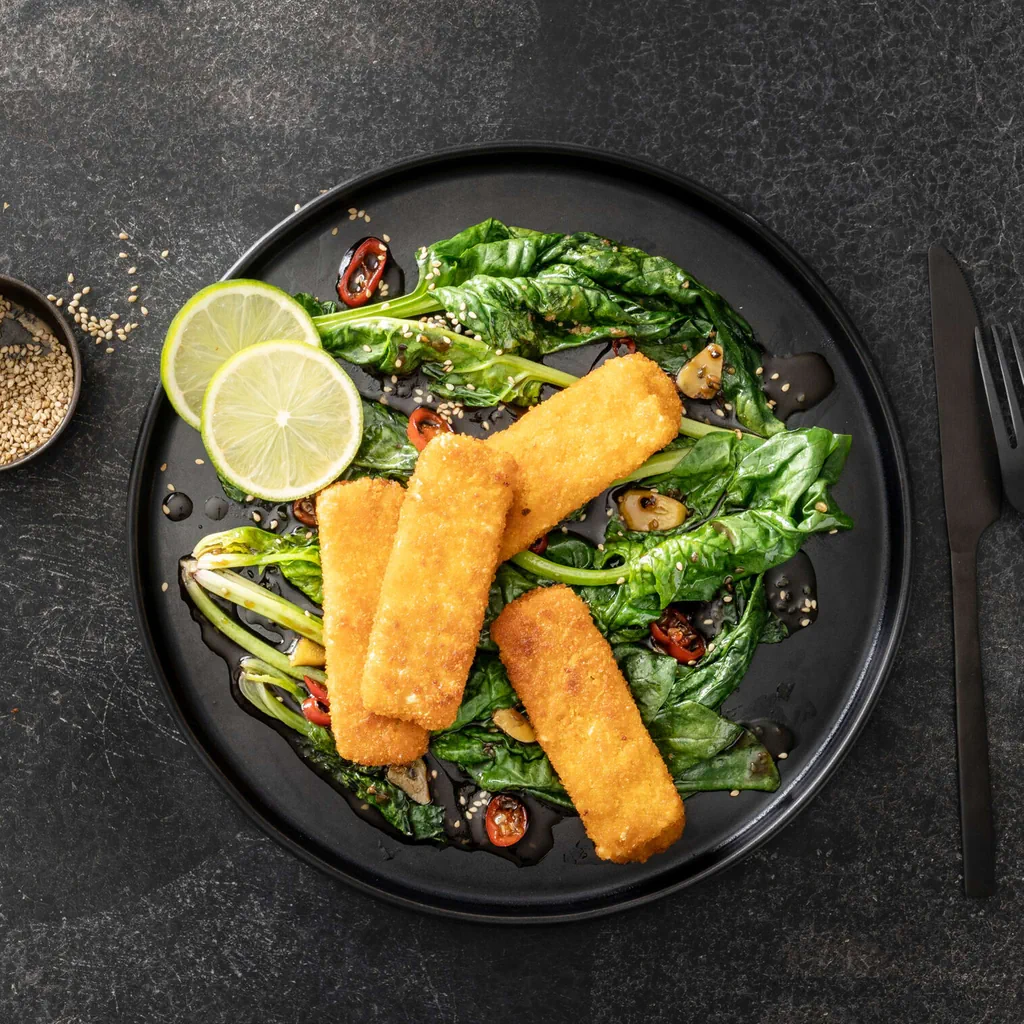 Vegane Sea Style Sticks auf Teriyaki-Spinat