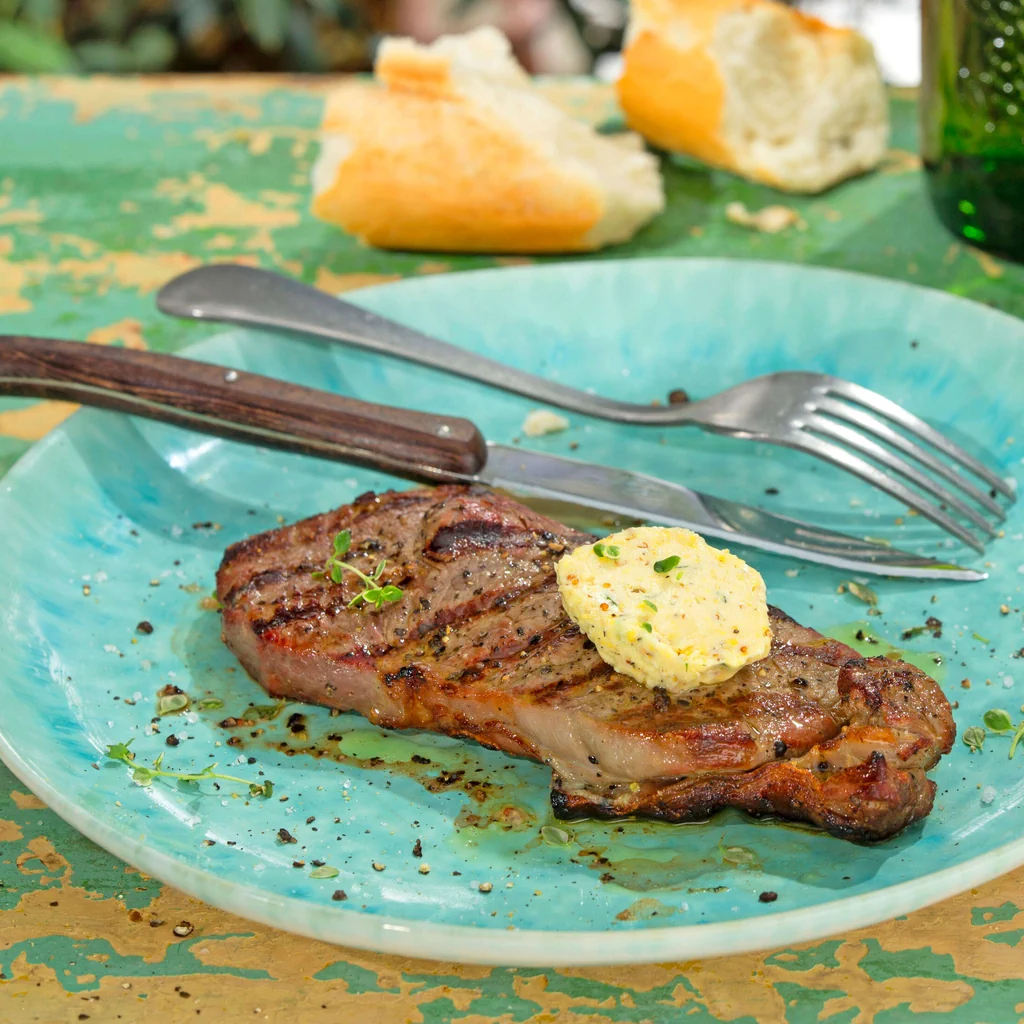 Entrecôte con burro al timo limone