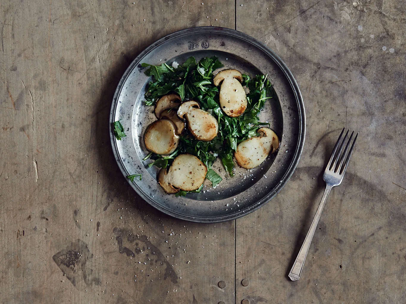 Cèpes rissolés sur salade de roquette