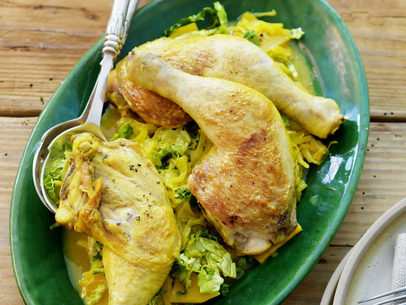 Cosce di pollo su letto di verdure alla curcuma