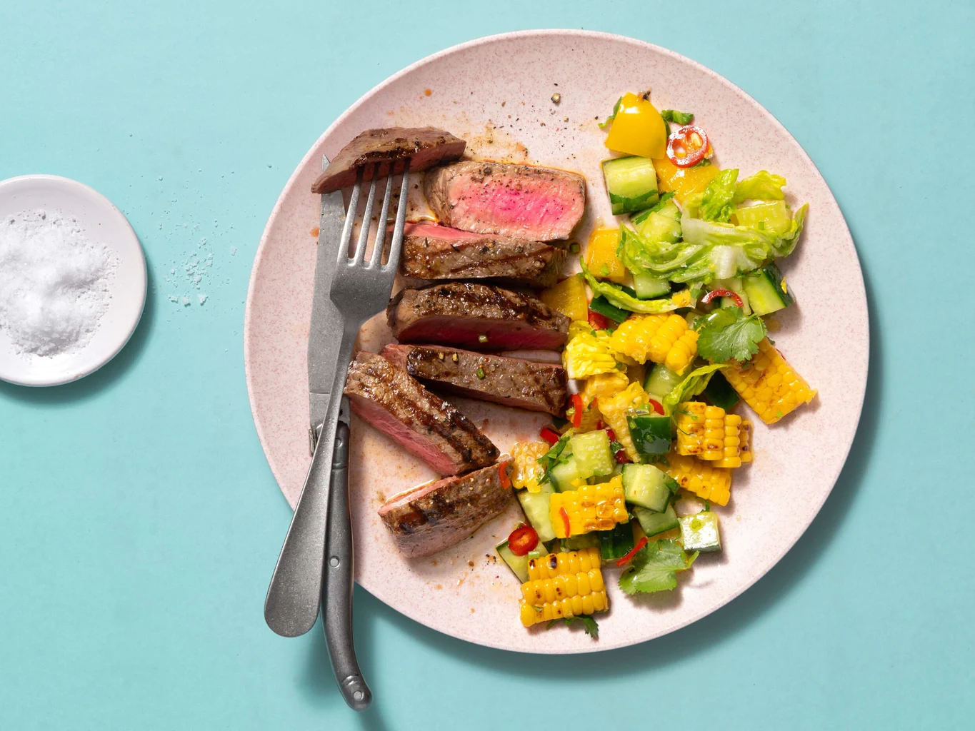 Romsteck avec salade au maïs grillé
