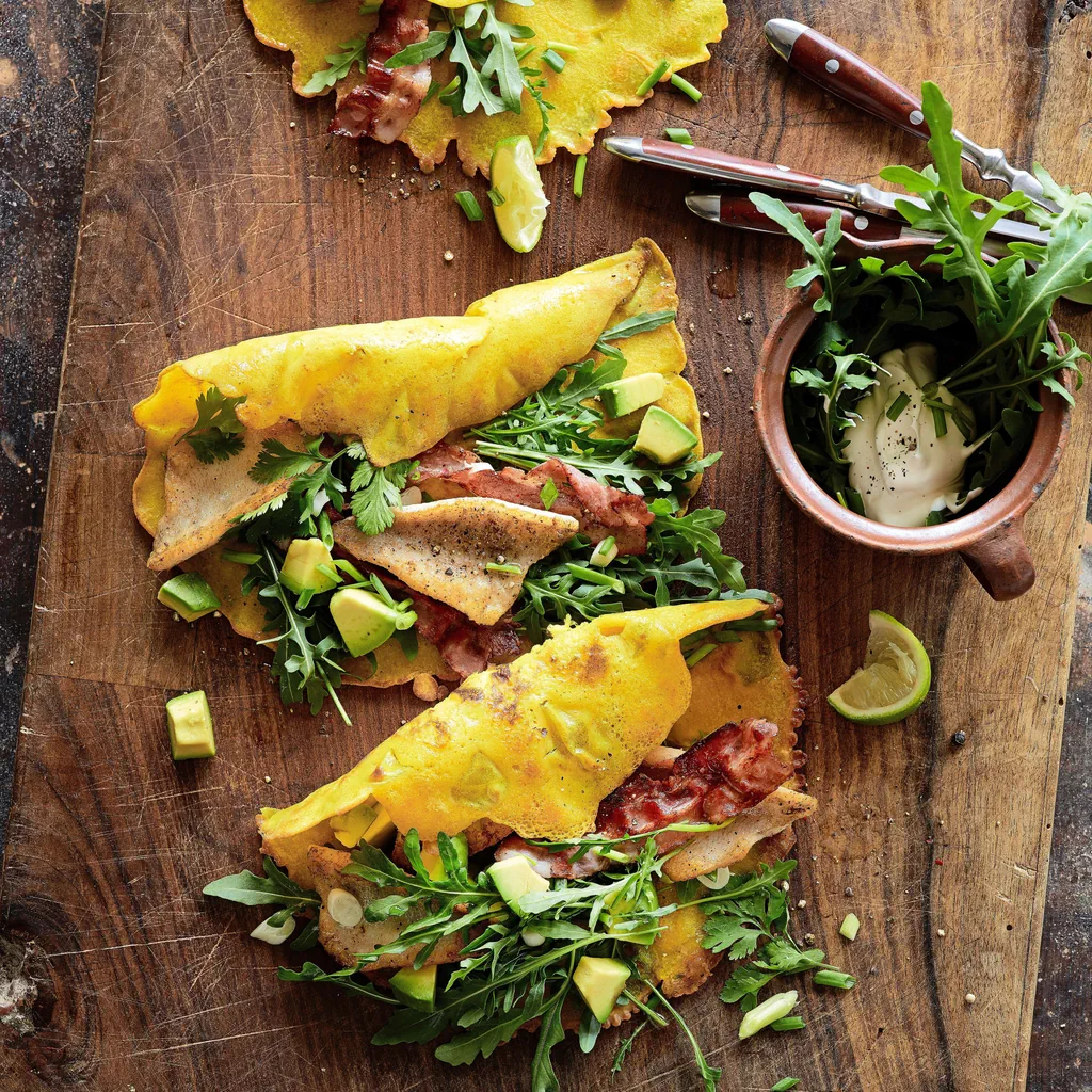 Filetti di pesce persico e pancetta in crêpe al cocco