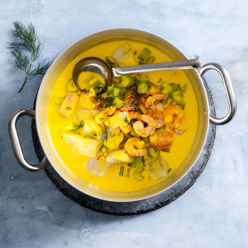 Fischpfanne an Safransauce