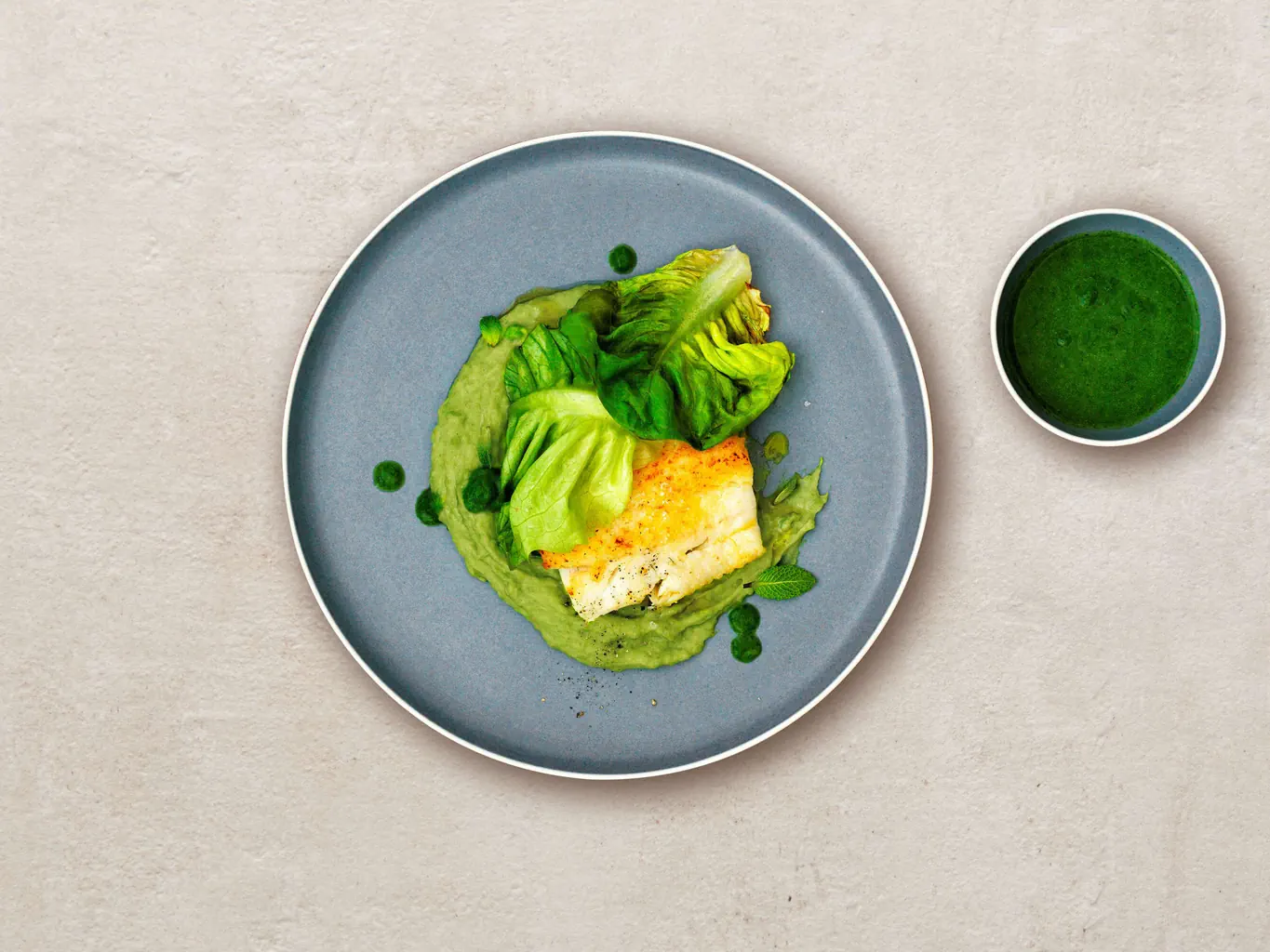 Sandre et laitue pommée sur purée de petits pois