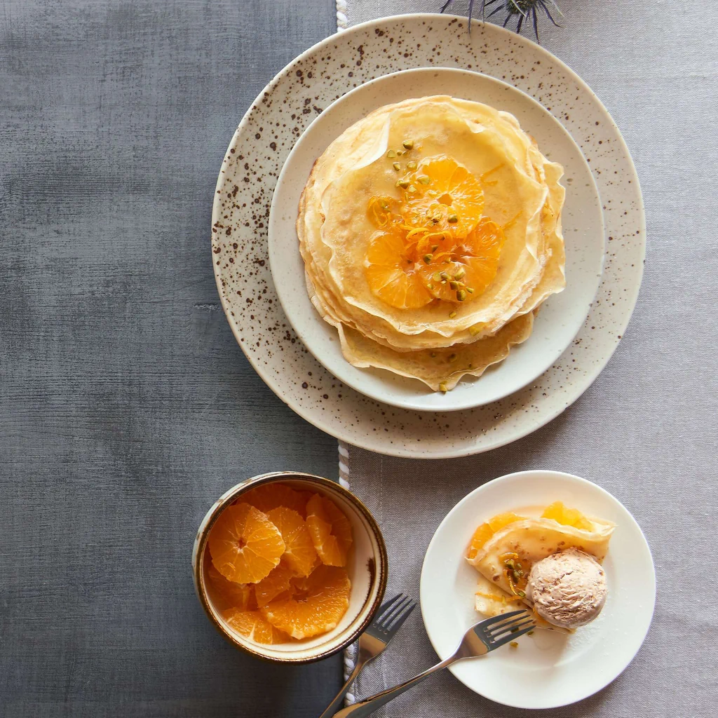 Crêpes à l'orange avec salade d'oranges