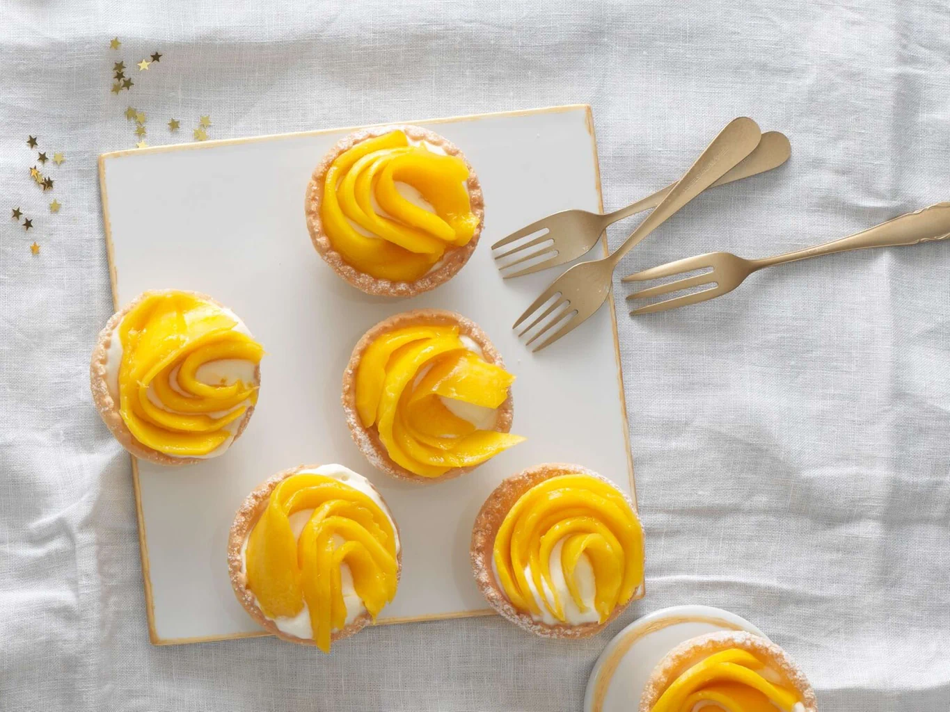 Tartelettes mit Kokoscreme und Mango