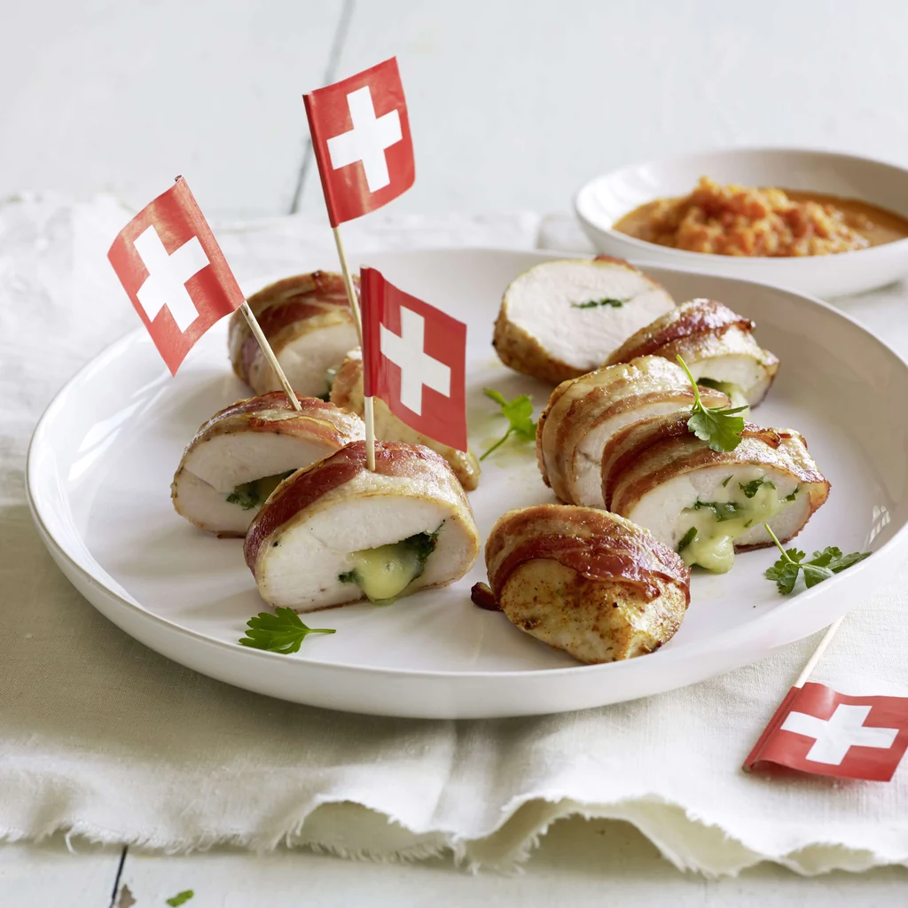 Häppchen von Pouletbrüstchen mit Gemüsesauce