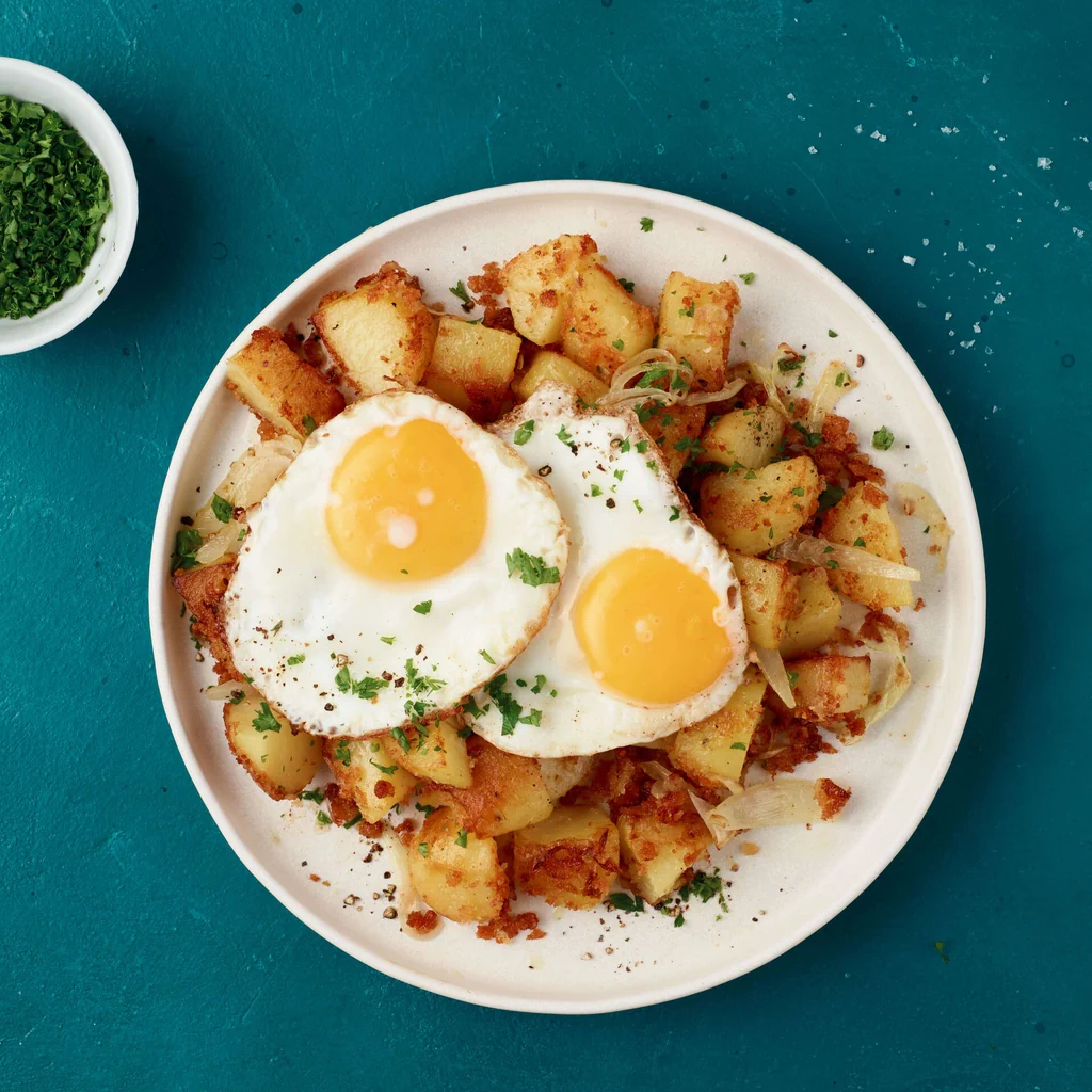 Patate arrosto con uova al tegamino