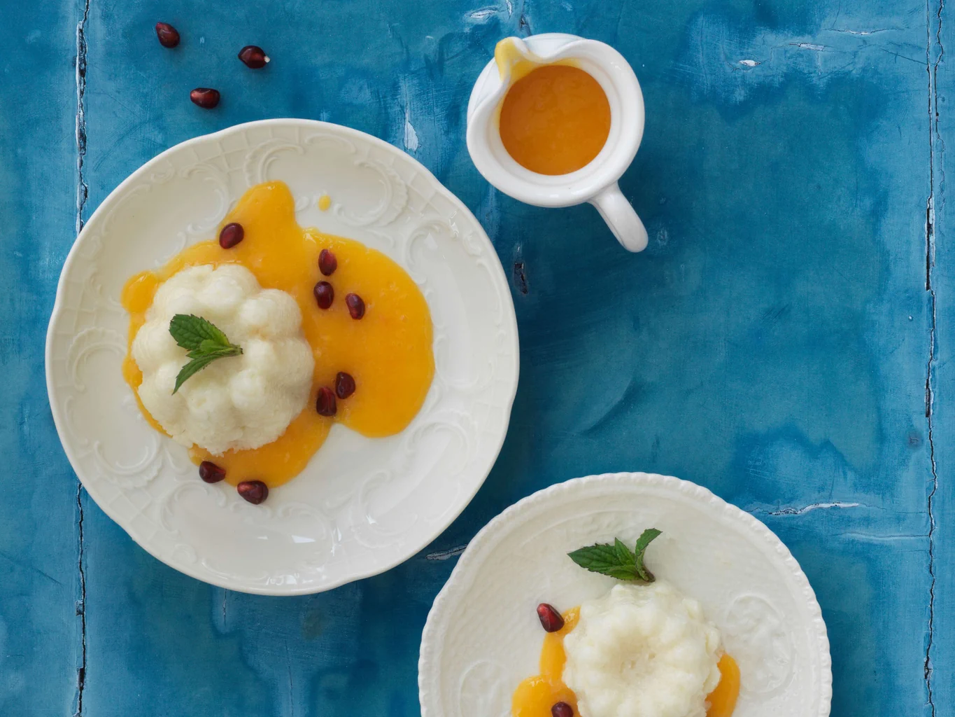 Reispudding mit Kokos, Granatapfel und Mangosauce