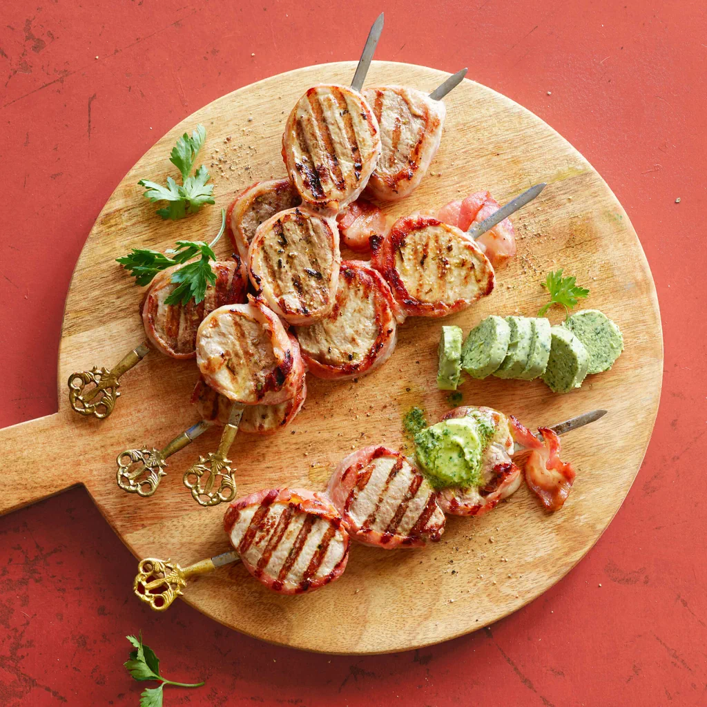 Medaglioni di maiale in manto di pancetta