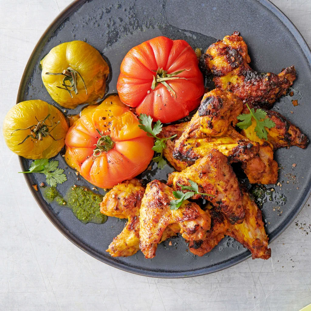 Poulet au curcuma avec tomates 