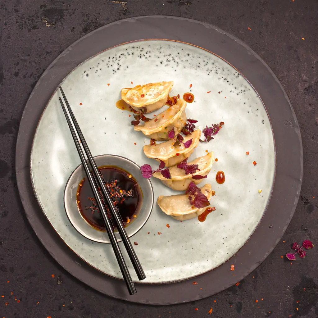 Gyoza ripieni di carne