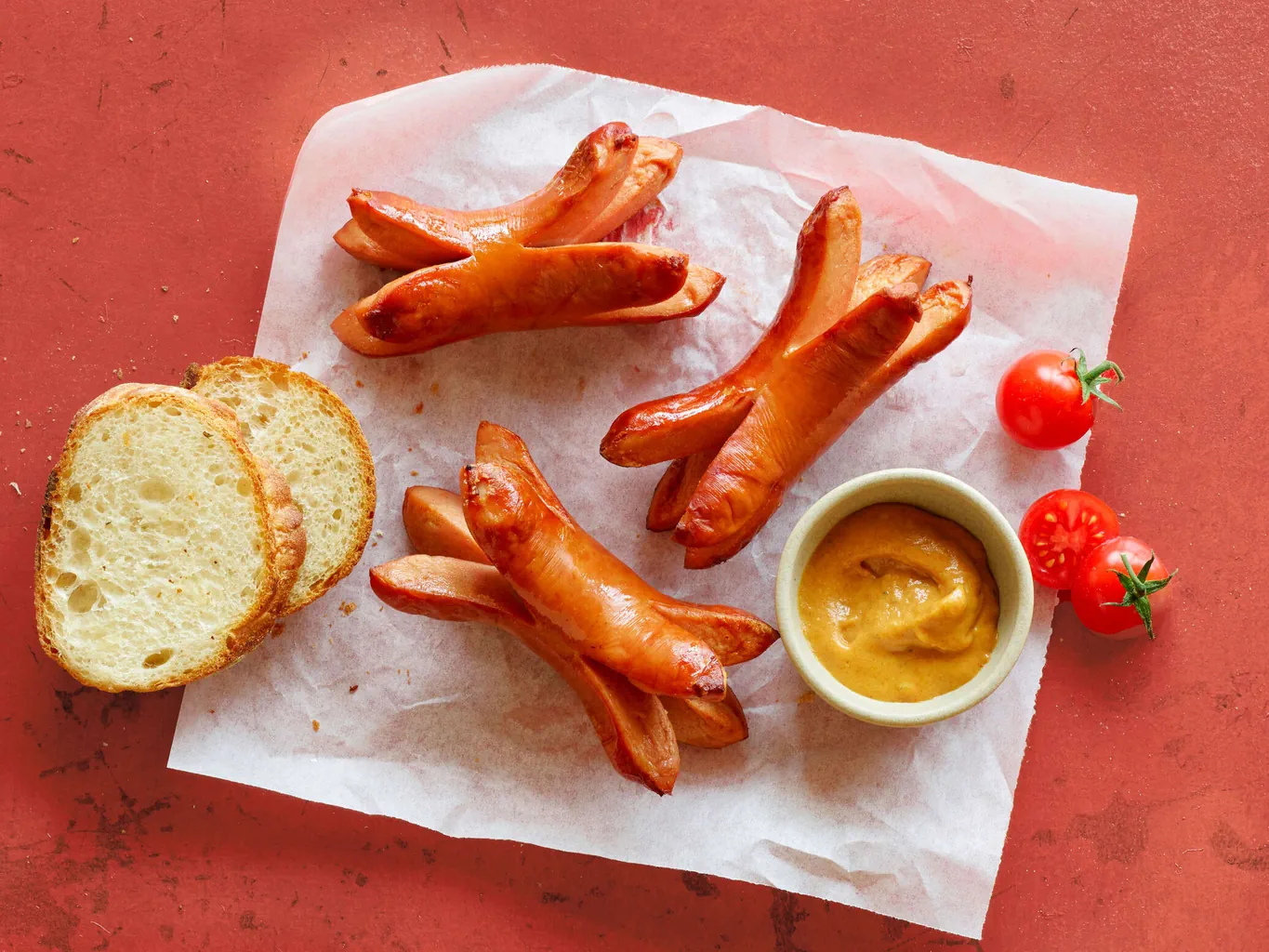 Cervelas con salsa BBQ alla senape 