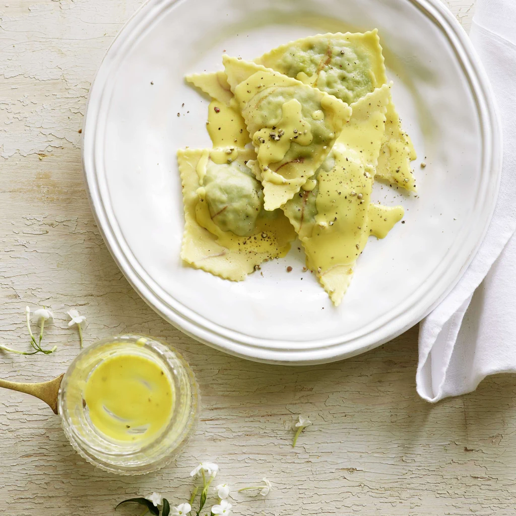 Spinattriangoli mit Safransauce