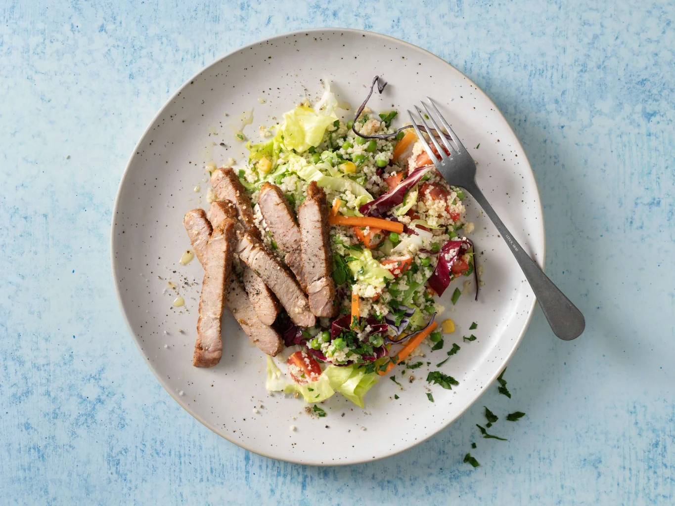 Steak de porc sur couscous