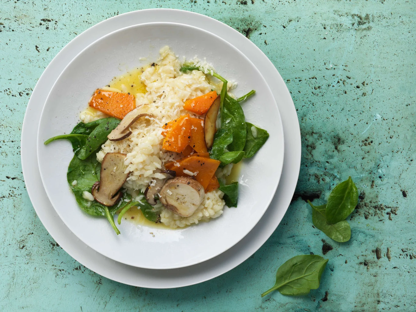 Risotto mit gebratenem Kürbis, Steinpilzen und Spinat