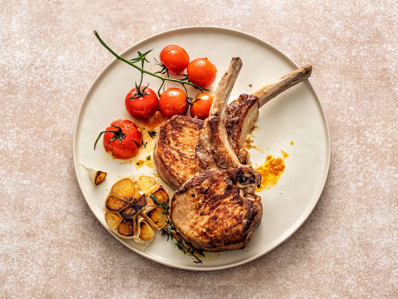 Schweinskotelett mit Curry-Tomaten
