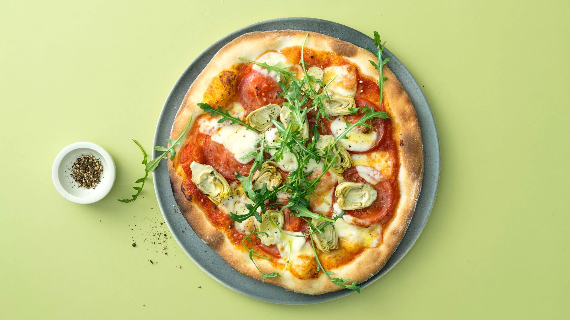 Pizza ai carciofi e alla rucola