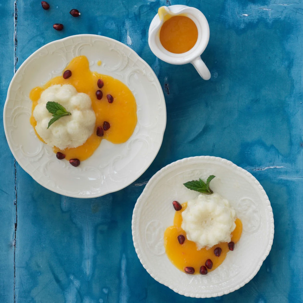 Reispudding mit Kokos, Granatapfel und Mangosauce