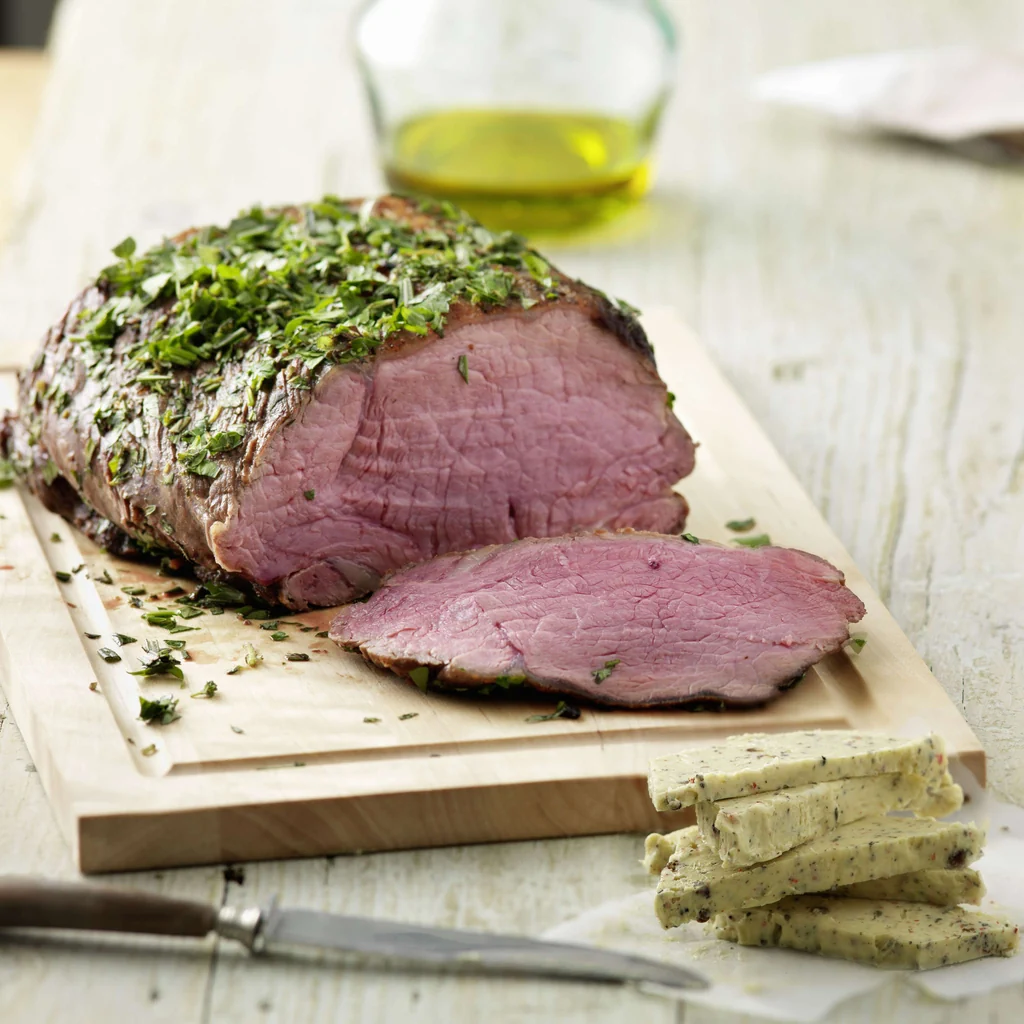 Entrecôte im Kräutermantel mit Pfeffer-Senf-Butter