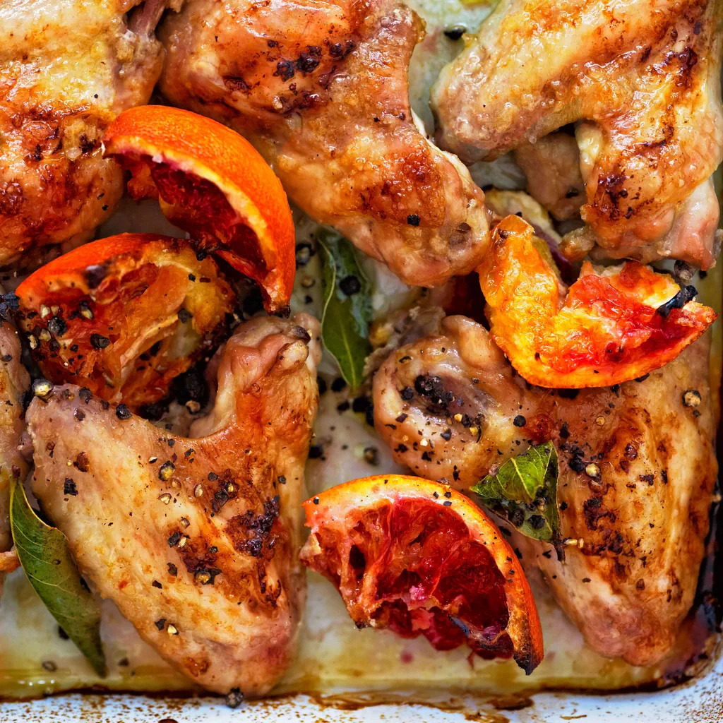 Alette di pollo glassate con arance rosse