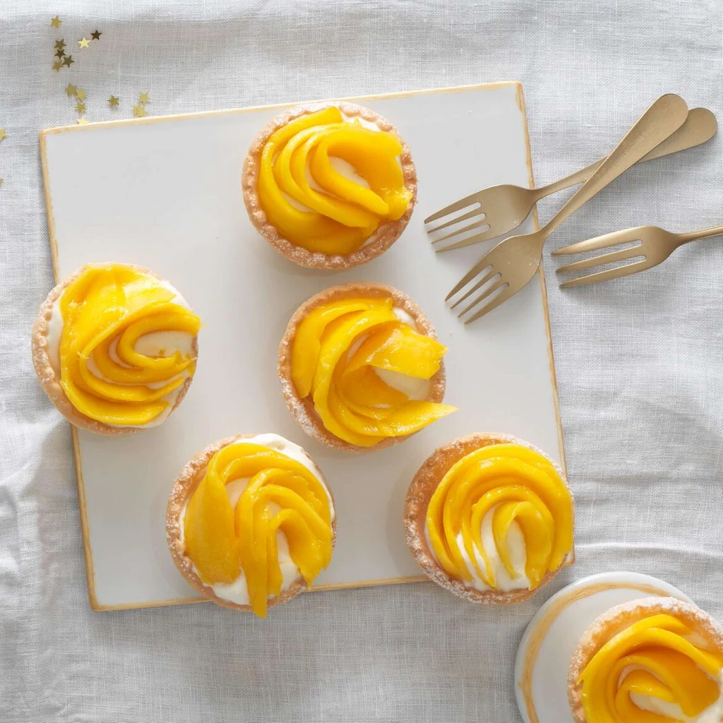 Tartelettes mit Kokoscreme und Mango