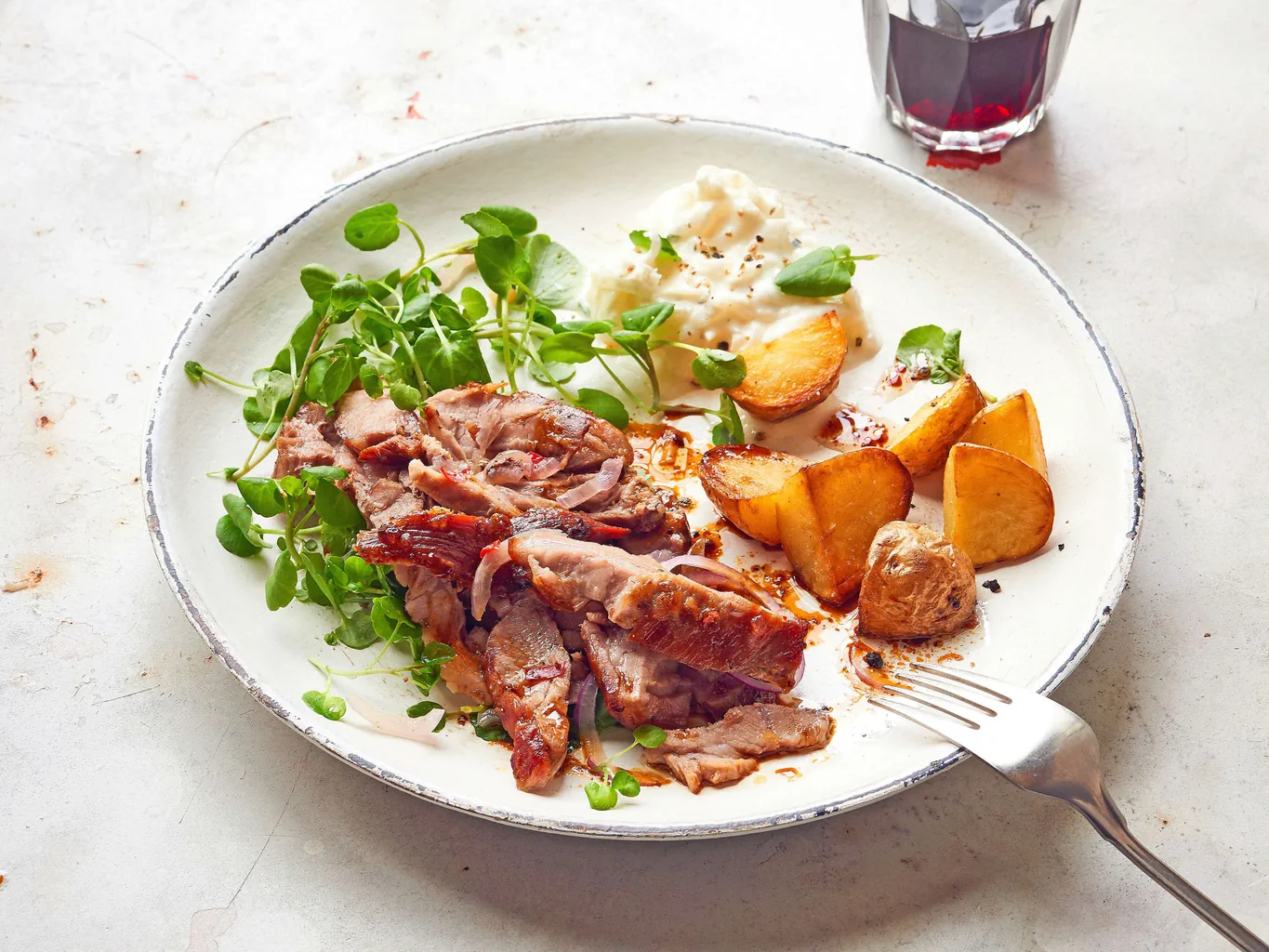Rôti de porc farci aux oignons