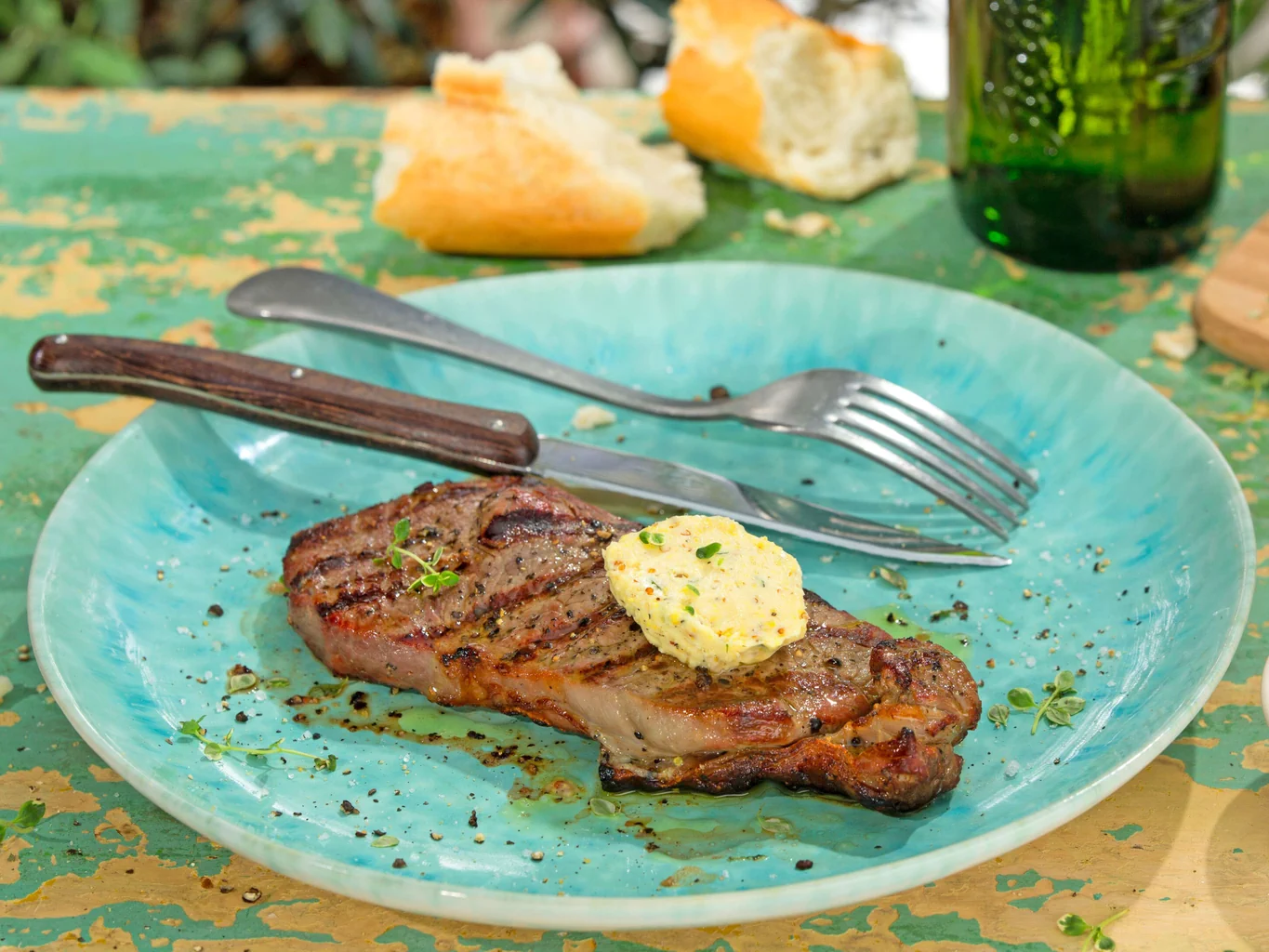 Entrecôte con burro al timo limone