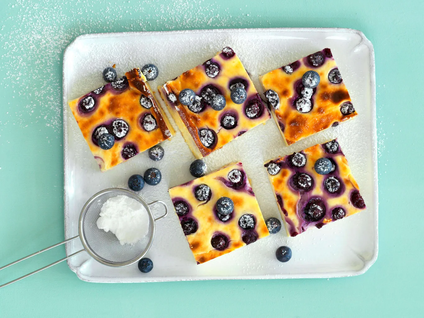 Quadrati di cheesecake ai mirtilli