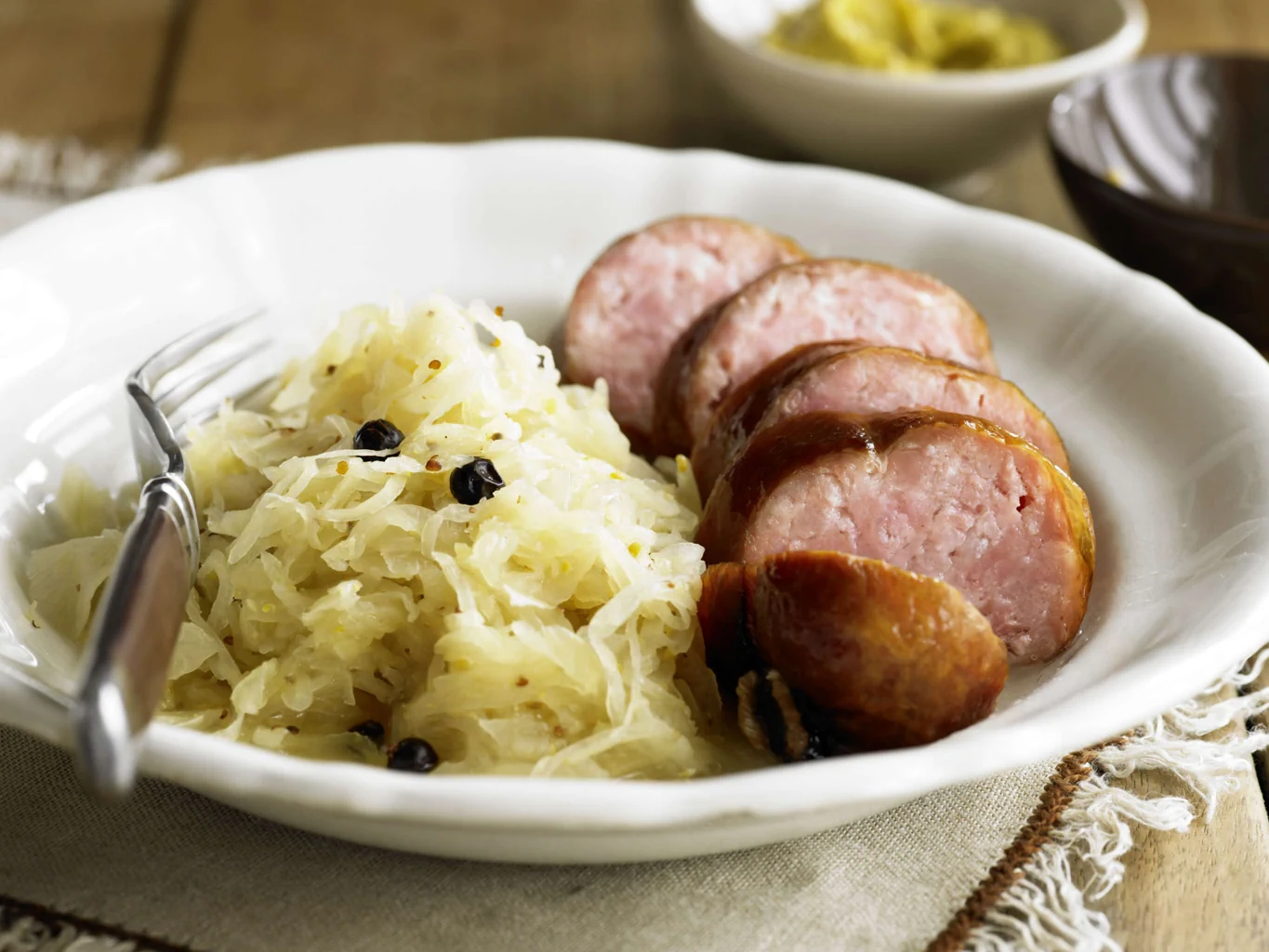 Saucisson con crauti al miele e alla senape