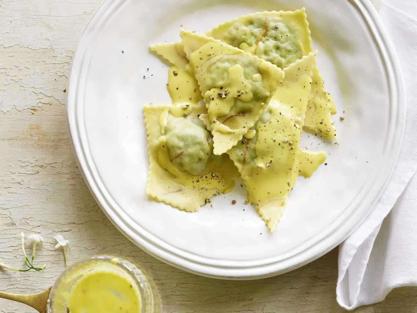 Spinattriangoli mit Safransauce