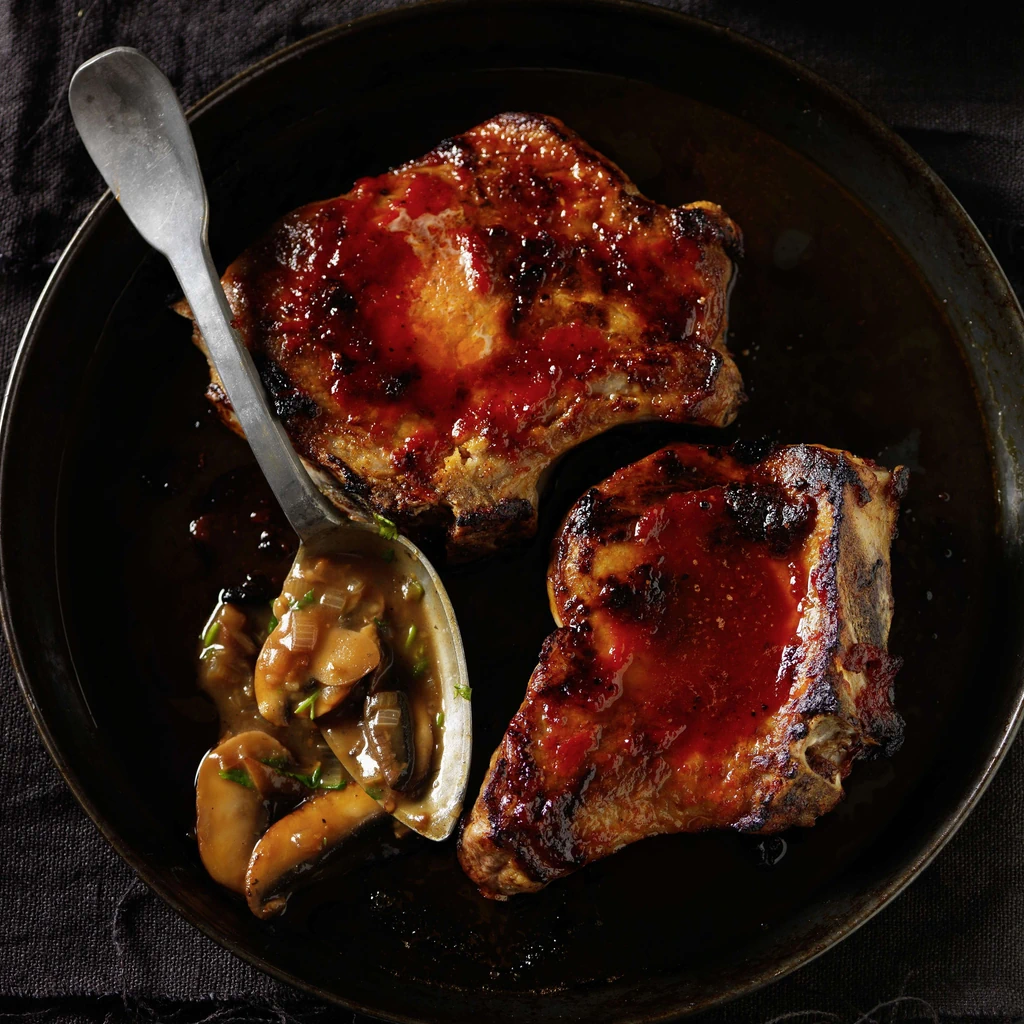 Schweinskoteletts mit Champignonsauce