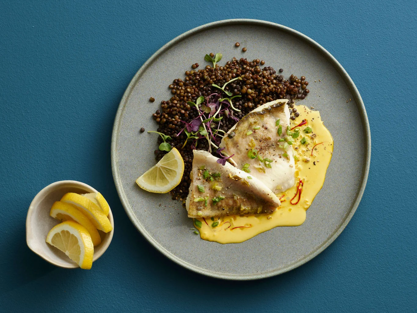 Sandre sur lentilles et sauce au safran