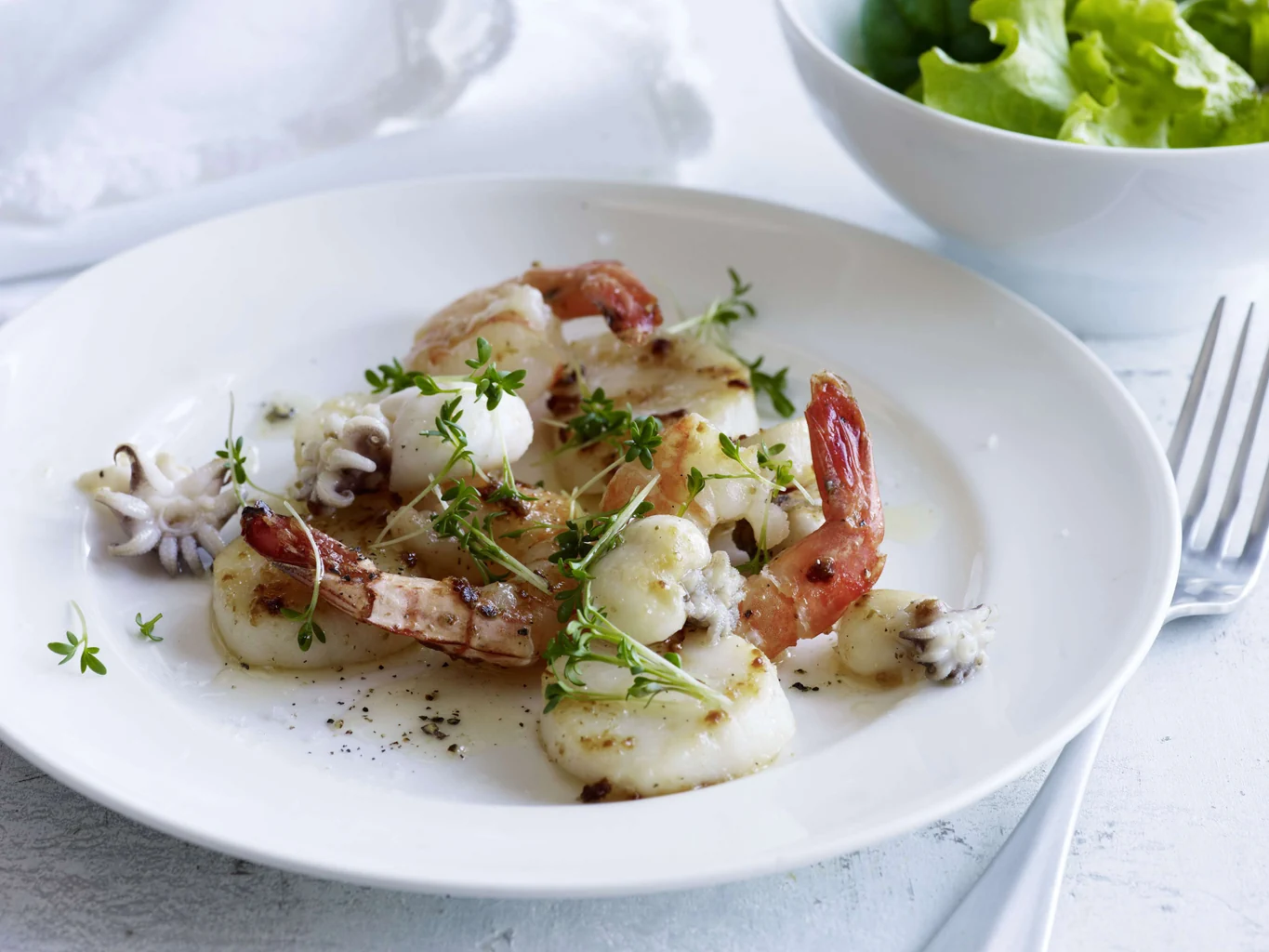 Gebratene Meeresfrüchte mit Kresse-Öl