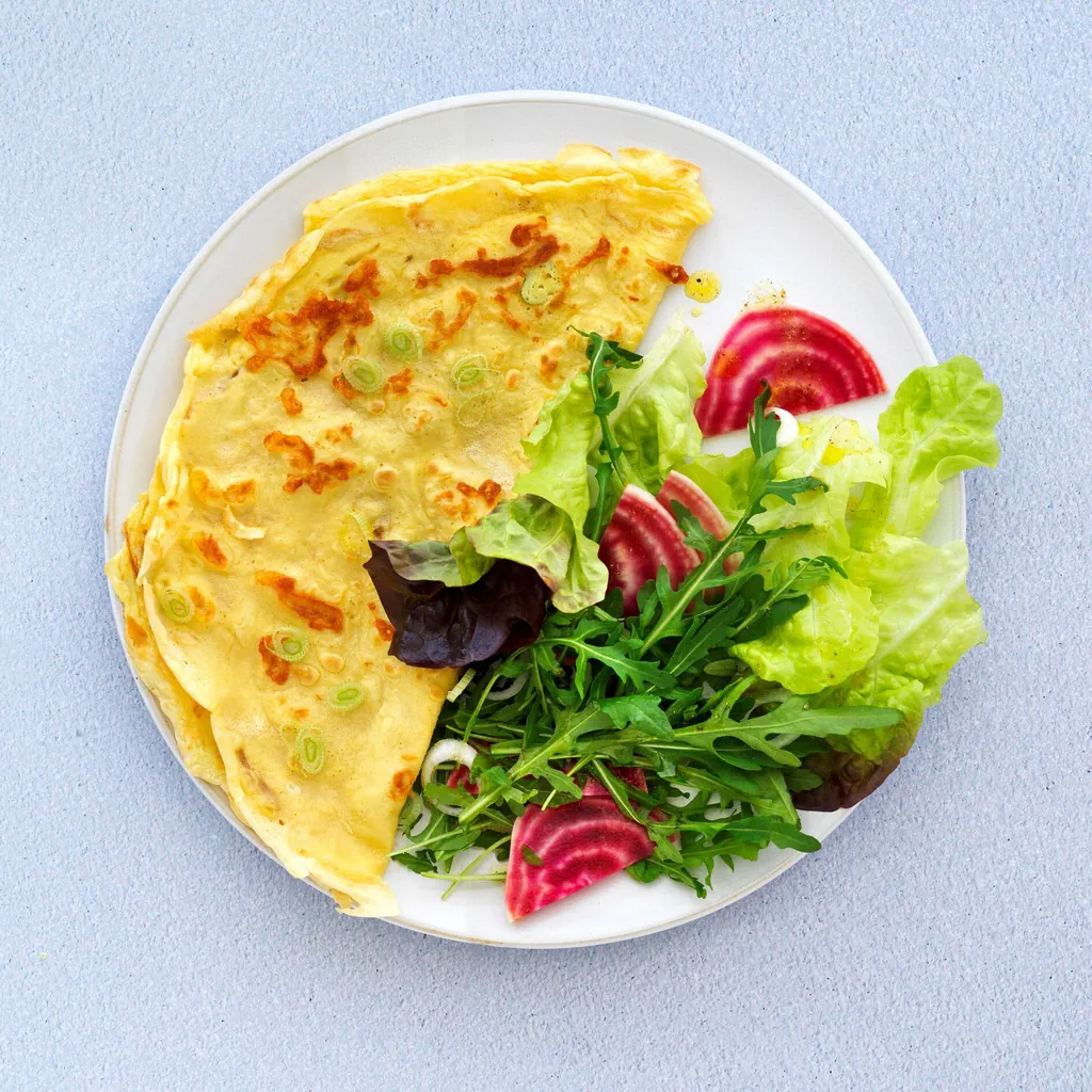 Crêpe al formaggio e cipollotto