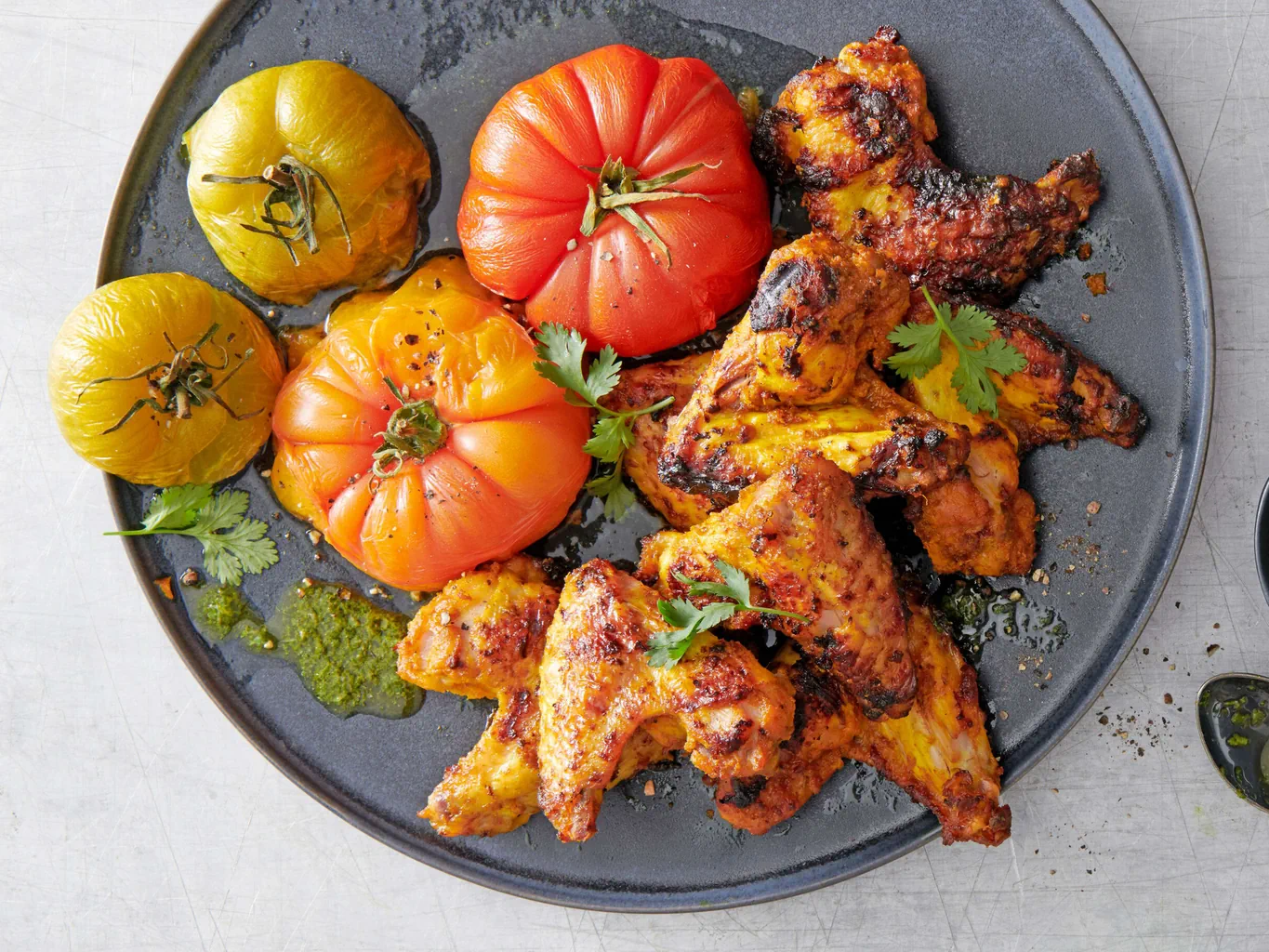 Kurkuma-Poulet mit Tomaten