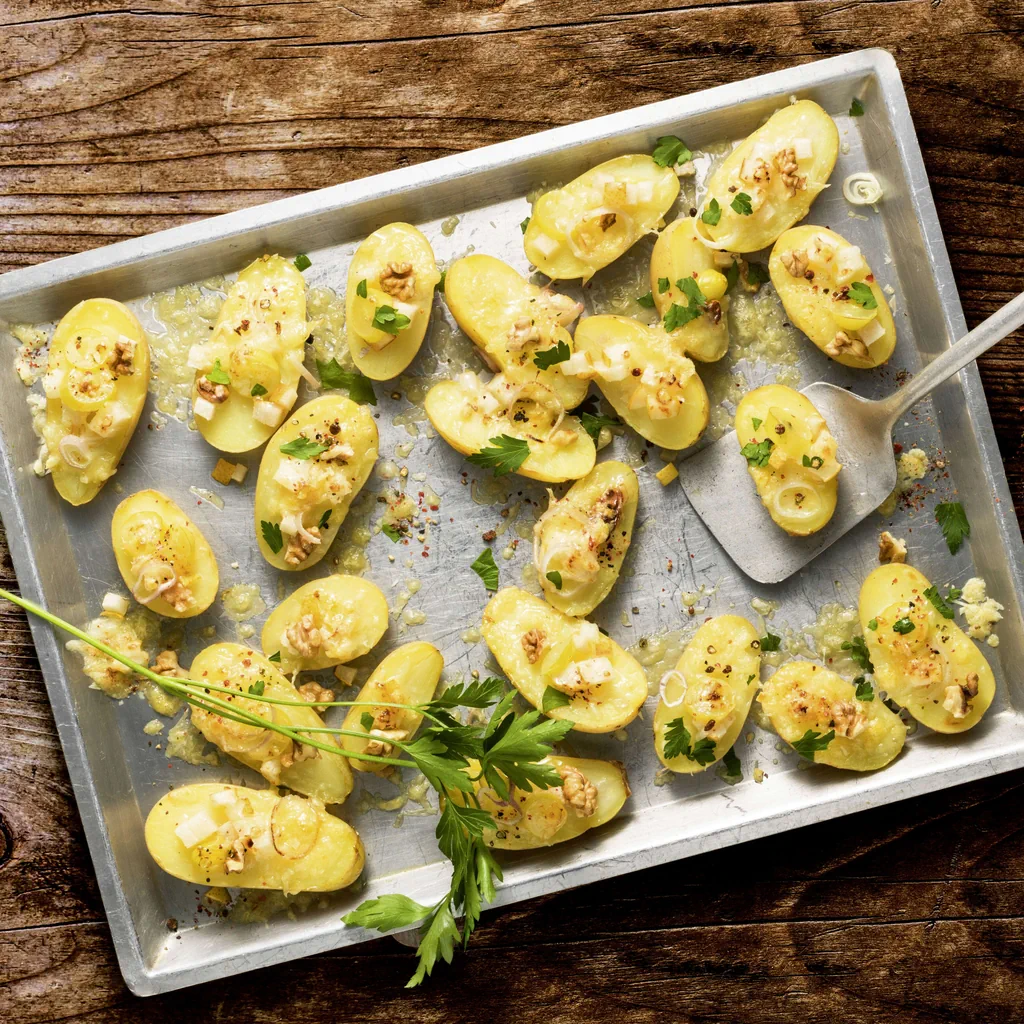 Patate gratinate con pere e uva
