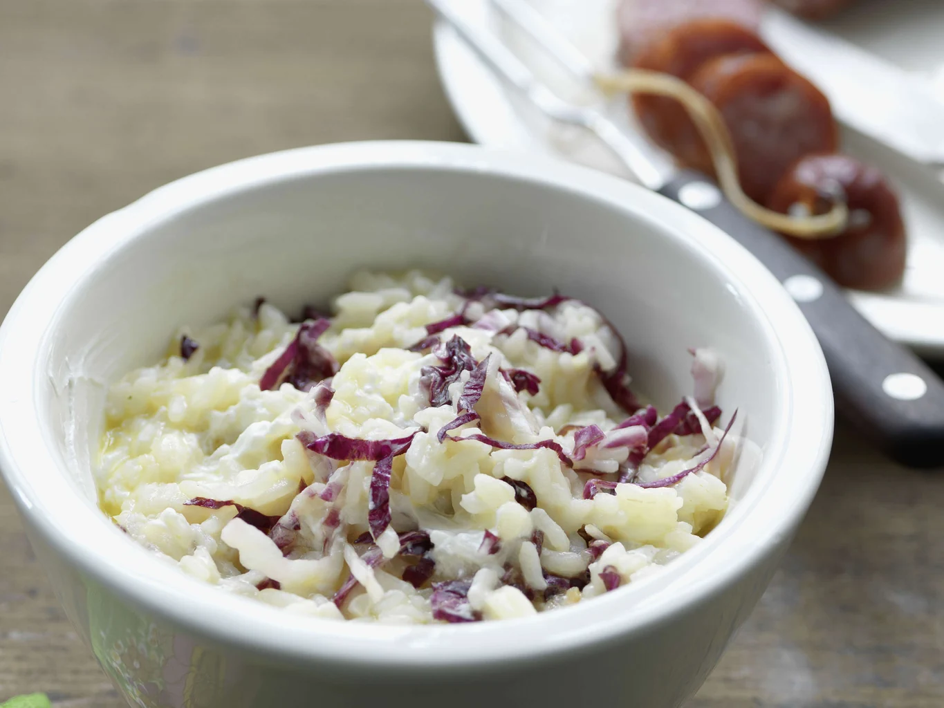 Saucisson con risotto all’assenzio