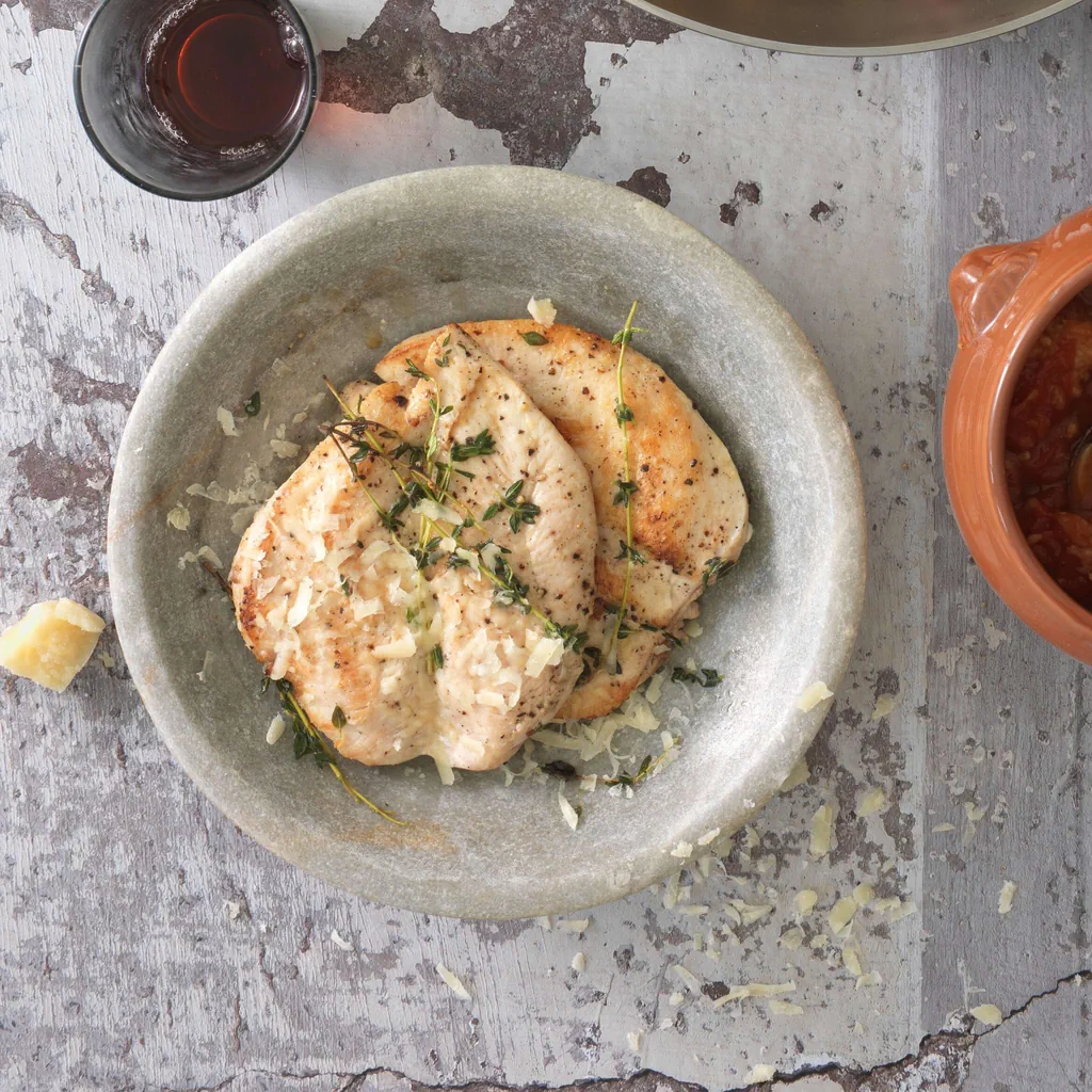 Pouletbrust mit Parmesan und Tomaten