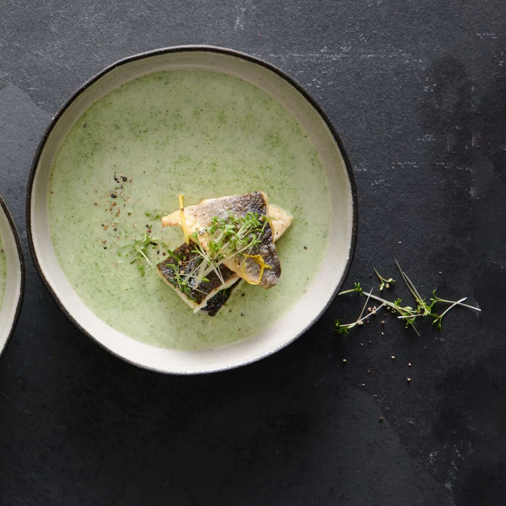 Vellutata di crescione con filetto di branzino
