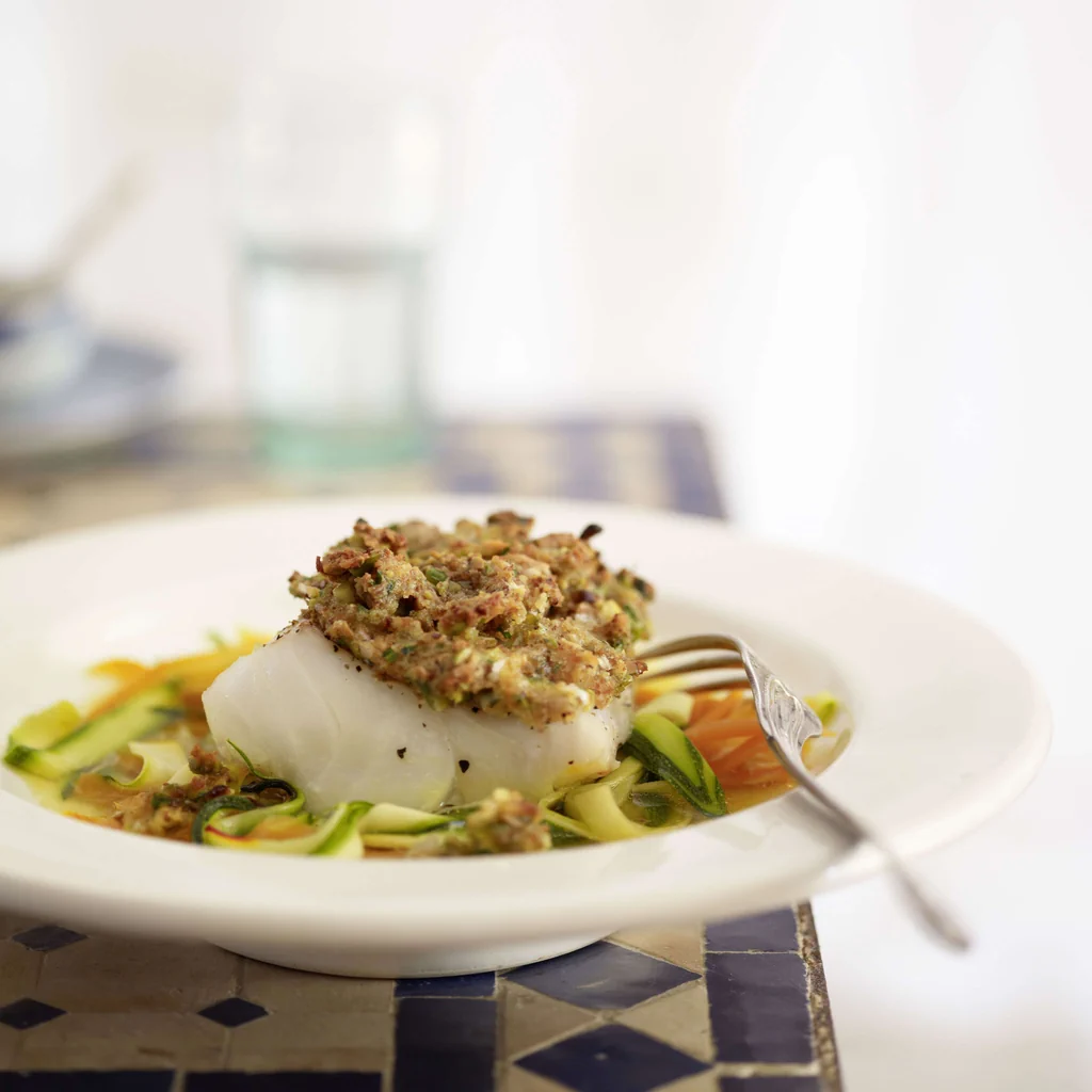 Fischfilet mit Pistazienkruste auf Gemüse